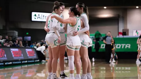Four in Double Figures Propel Fighting Hawks to First Win Under Hutter