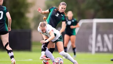 North Dakota Suffers Home Loss in Physical Battle Against Green Bay