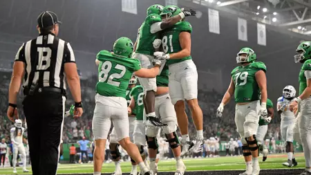 Fighting Hawks climb in latest national polls to No. 8/9